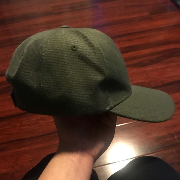 plain green baseball cap